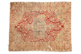 Antique Kaisary rug with oversize asymmetric medallion, allover floral, wine red, ivory, and silver tones.