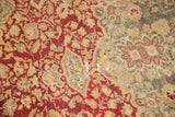 Large hole and foundation wear on wine red, saffron floral Antique Kaisary rug.
