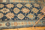 Antique Malayer runner corner with indigo field's even wear and light sky blue border tatter.