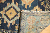 Hand-knotted antique Malayer rug: dark blue field, woven reverse, and tattered fringe detail.