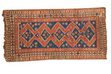 Vintage Caucasian rug, madder root red and indigo blue geometric stepped diamond medallion.