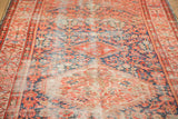 Antique Malayer runner's classic henna plant motif, with visible wear and exposed foundation.