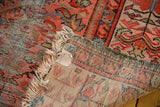 Reverse detail of hand-knotted antique Malayer rug with visible foundation, tattered fringe.
