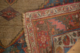 Antique Persian Bijar rug corner detail: madder red tribal geometric border, intact fringe, camel field.