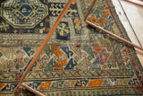 Geometric comb animal and pinwheel motifs with textural variations on the antique Caucasian rug.