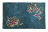 Vintage Nichols Art Deco rug, denim blue open field with asymmetric rose, orange floral bouquets. 3x5.