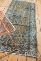 Visible wear on distressed Hamadan rug runner, showing herati motif and Serbend vine border.