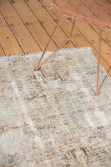 Distressed Karaja style Hamadan rug showing worn texture, knot heads, and faded geometric patterns.