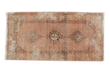 Distressed Hamadan rug runner with triple medallion, allover botehs, pale rose, and ivory shades.