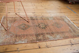 Distressed Hamadan runner, its worn triple medallions displaying faded mint and rose.