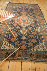 Antique Kamseh runner's dark blue, copper, ivory motif, detailed border, and fringe.
