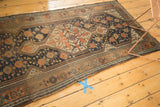 Antique Kamseh runner corner with secure woven border and madder root red geometric details.
