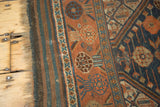 Kamseh runner with intricate scale motif, copper, dark blue, ivory, and striped kilim end, circa 1900.
