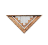 Reclaimed wood triangular wall art with white stepped geometric pattern, 20x9.5 inches.