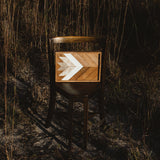 Rustic reclaimed wood art with white, beige, and natural brown chevron pattern.