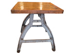 Antique copper top table with reclaimed wood and distressed industrial bronze base.