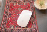 Bijar Deep Red MouseRug, an allover Heriz design with a white computer mouse.