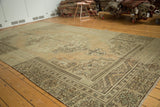 Vintage Oushak rug with apricot abrash, scrolling leaves, and stepped borders.