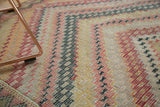 Hand woven Turkish Jijim with randomly alternating stepped patterns in black cherry, ivory, silver.