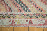 Hand woven Turkish Jijim flatweave detail: stepped patterns, distinct border in red and ivory.