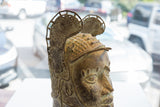 Detailed right profile of the vintage African prince head showing its textured patina.