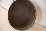 Vintage Wooden African Bowl showing aged interior with visible zigzag repair.