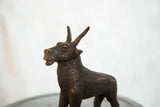 Vintage African copper topi sculpture's head, detailed with an aged patina.
