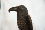 Detailed head, hooked beak, and rich copper patina on the vintage African eagle sculpture.