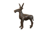 Vintage African antelope sculpture in dark copper with textured, spiral horns.