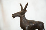 Copper vintage African antelope sculpture, featuring head and twisted horns.