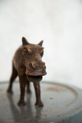 Vintage African copper hippo, close-up of textured snout and open mouth detail.