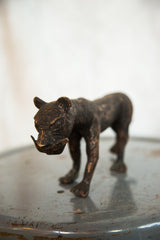 Detailed textured copper head of the vintage African tiger sculpture.