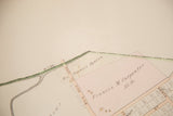Detail view of property names and land divisions on the early 20th century Mount Kisco map.