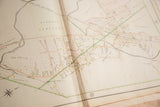 Detailed section of vintage Mount Kisco map, displaying aged paper and property divisions.