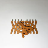 Amber bamboo Arcs Menorah pieces disassembled and interlocking, with nickel candle cups.