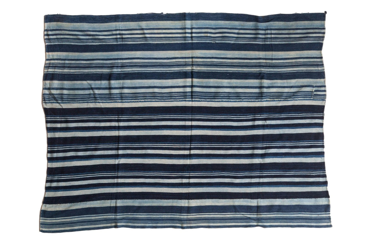 Vintage handwoven African indigo textile throw with diverse blue and white stripes, 4x5.