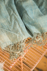 Textured fringed edge of the hand woven vintage Mossi indigo textile.