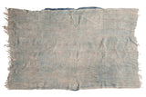 Hand-woven Denim Mossi Indigo African textile throw with faded horizontal stripes.