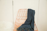 Denim Mossi Indigo African Textile Throw, handwoven, with subtle texture and fringed edge.
