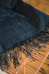 Deep indigo African hand-woven textile fringe, showing vintage texture and subtle color variations.