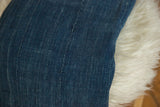 Denim Mossi Indigo African textile, hand-woven with varied texture and vertical stitching.