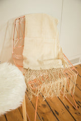 Natural African textile with beautiful long hand-woven cotton tassels.