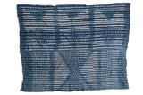 Collectible vintage African indigo textile throw, hand-dyed with geometric striped patterns.