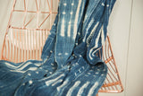 Detail of the supple Batik Indigo African textile, highlighting its intricate hand-dyed patterns.