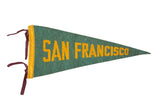 1940s San Francisco CA felt flag in green with bold yellow text and maroon ties.