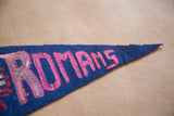Vintage blue felt pennant with faded pink and white ROMANS lettering.