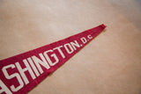 Worn, pointed tip of the vintage 1960s Washington D.C. felt flag.