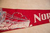 Norfolk VA felt flag detail, cream battleship graphic on red felt with patina.