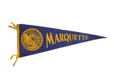 Marquette felt pennant, deep blue with golden yellow university crest and name.
