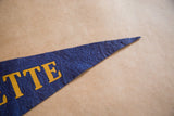 Vintage blue felt pennant point with gold Marquette lettering.